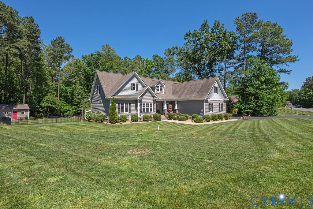 6446 Chestnut Church Road Mechanicsville, VA 23116 - Photo 2 of 49 Gray siding residence featuring a covered front po