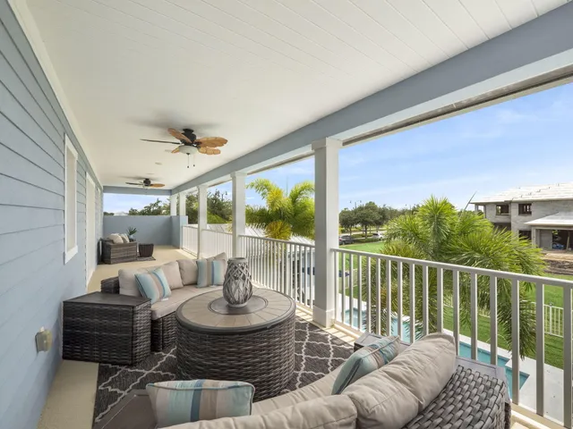 a bathroom with a double vanity sink mirror and toilet