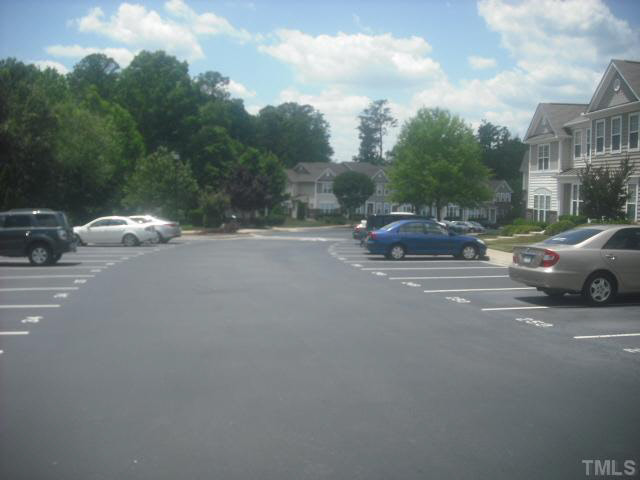 7663 Winners Edge Street Raleigh, NC 27617 - Photo 7 of 16 a view of street with parked cars