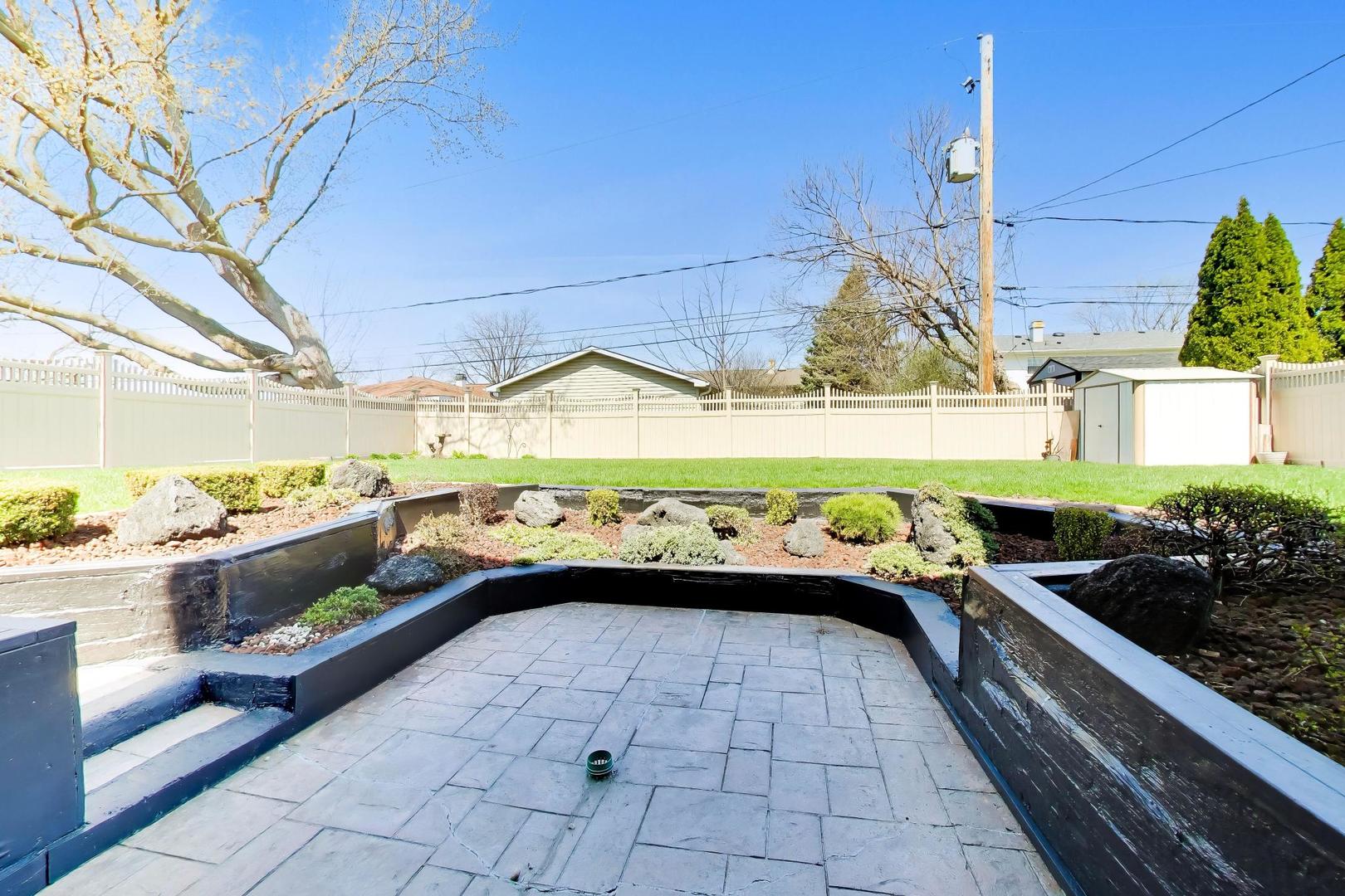 634 West Millers Road Des Plaines, IL 60016 - Photo 33 of 42 a front view of a house with outdoor seating
