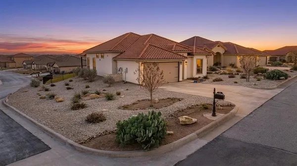 a view of a house with a bath tub and a fire pit