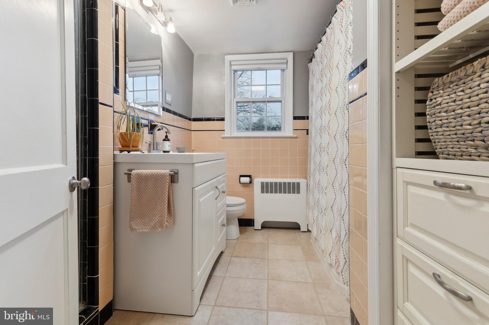1420 Lawndale Road Havertown, PA 19083 - Photo 12 of 15 a view of washer and dryer with bathroom in the background