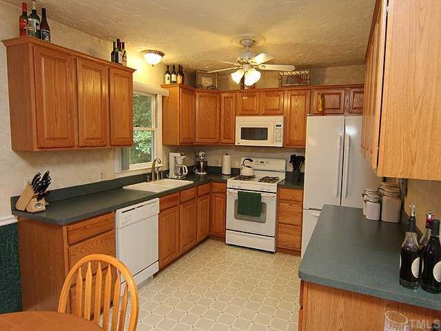 7505 Post Oak Road Raleigh, NC 27615 - Photo 5 of 23 An amazing amount of cabinet and counter space makes this kitchen very functional. Newer appliances include gas oven - a 220 outlet is also installed