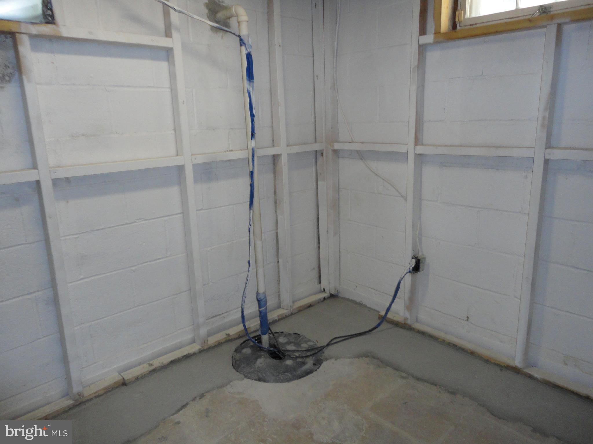 909 Timber Ridge Drive Hanover, MD 21076 - Photo 22 of 26 Basement - Sump Pump