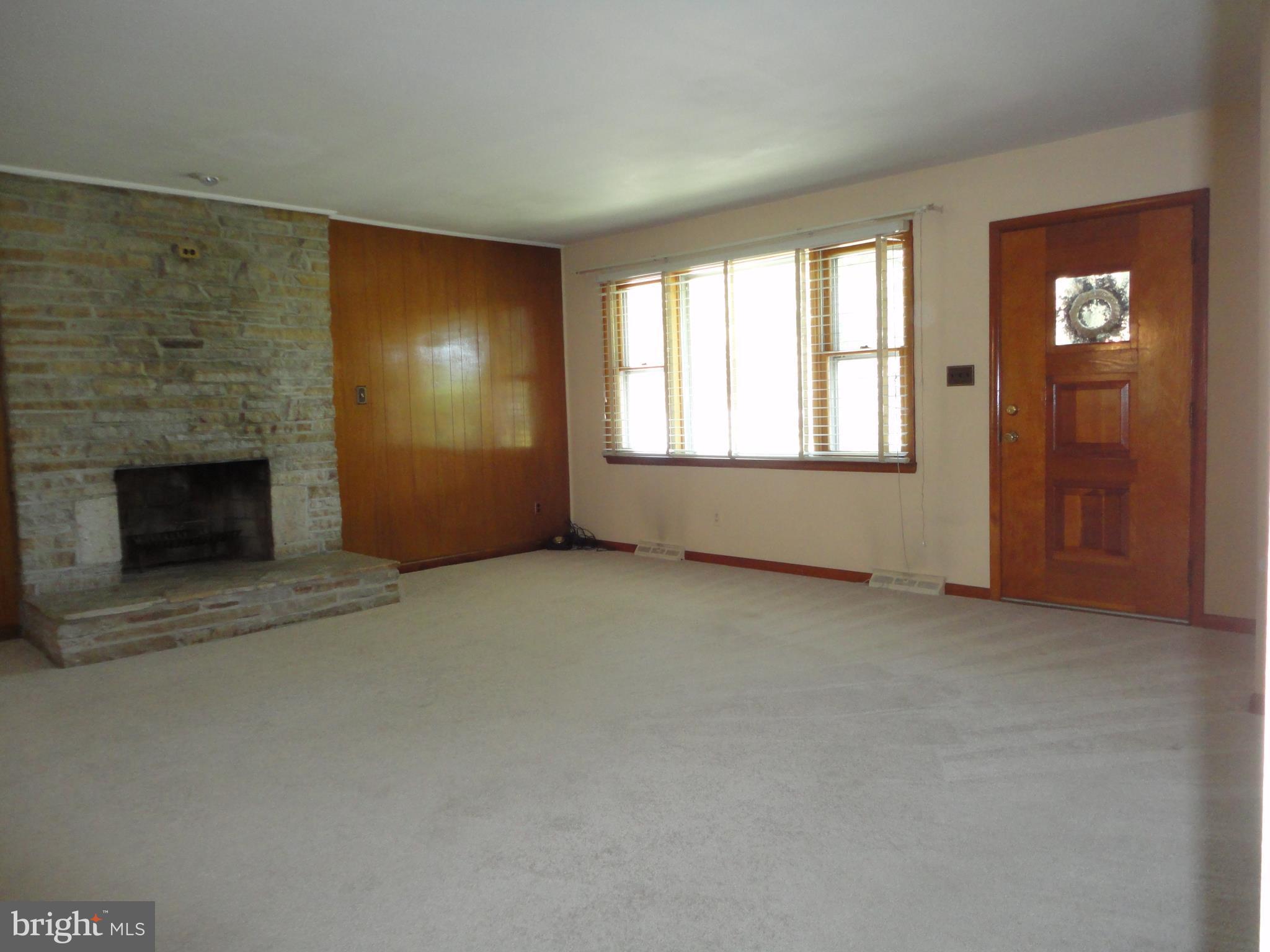 909 Timber Ridge Drive Hanover, MD 21076 - Photo 4 of 26 Spacious Living Room with Fireplace