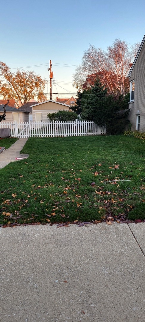 3531 North New England Avenue Chicago, IL 60634 - Photo 1 of 4 a view of a house with a yard