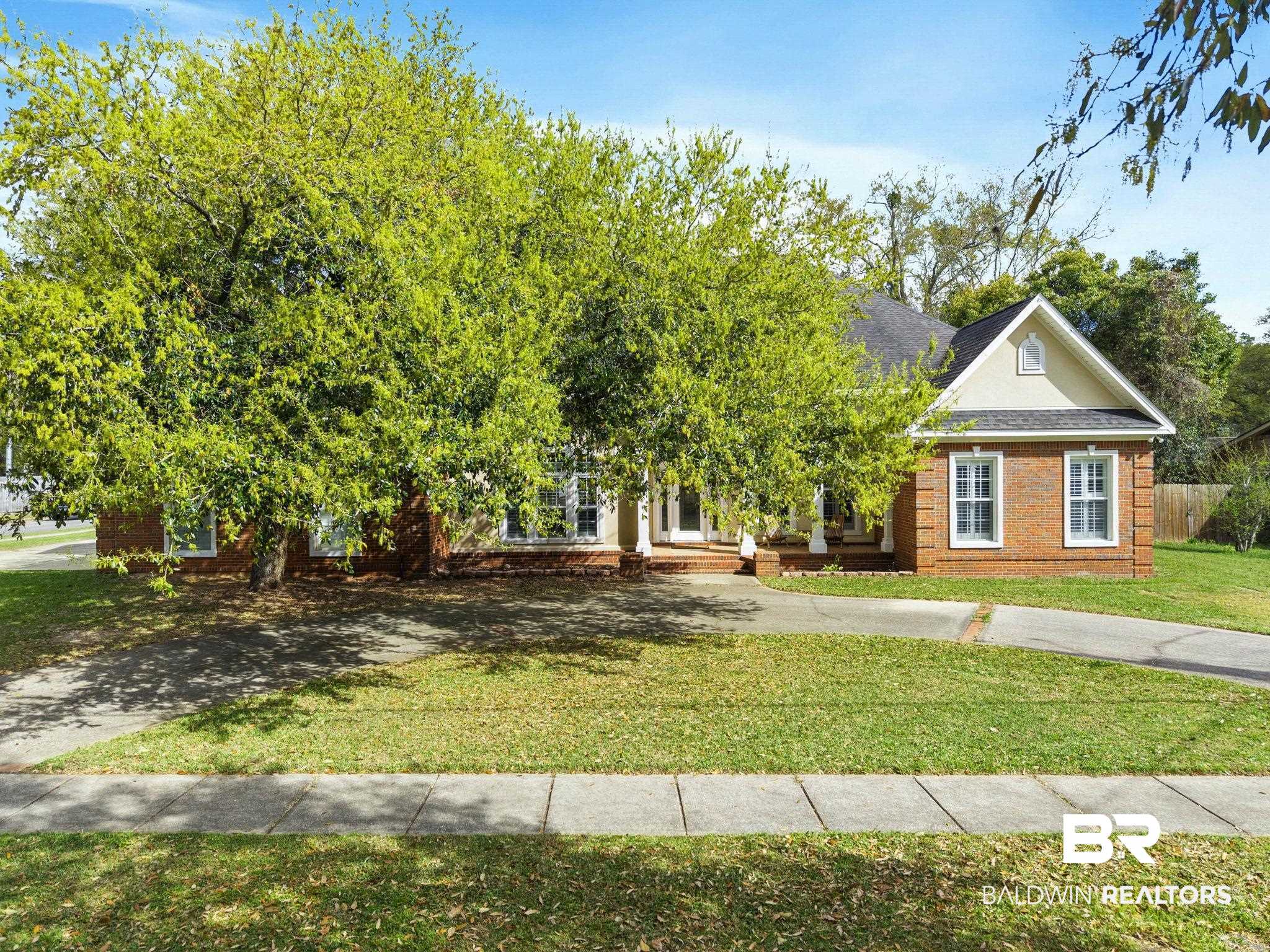 3668 Claridge Road North Mobile, AL 36608 - Photo 7 of 100 View of front of property featuring a shingled roof and brick siding