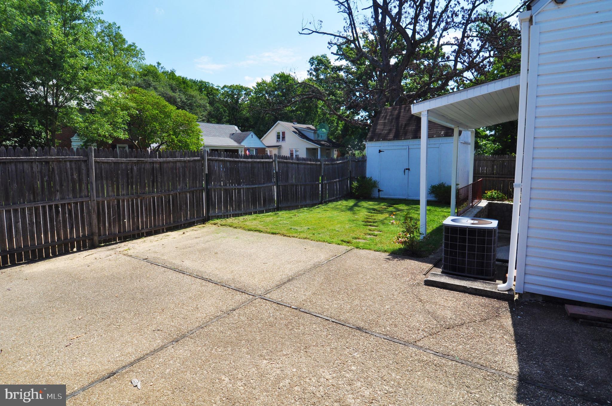 4702 Ridgeway Avenue Baltimore, MD 21206 - Photo 16 of 18 Large Patio and Fenced Rear Yard