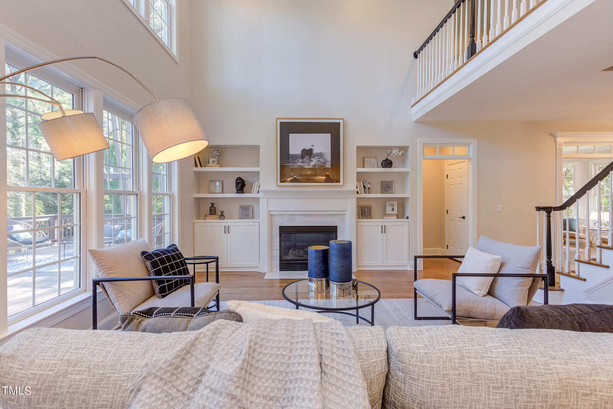 737 Loch Highlands Drive Raleigh, NC 27606 - Photo 17 of 85 a living room with furniture and a fireplace