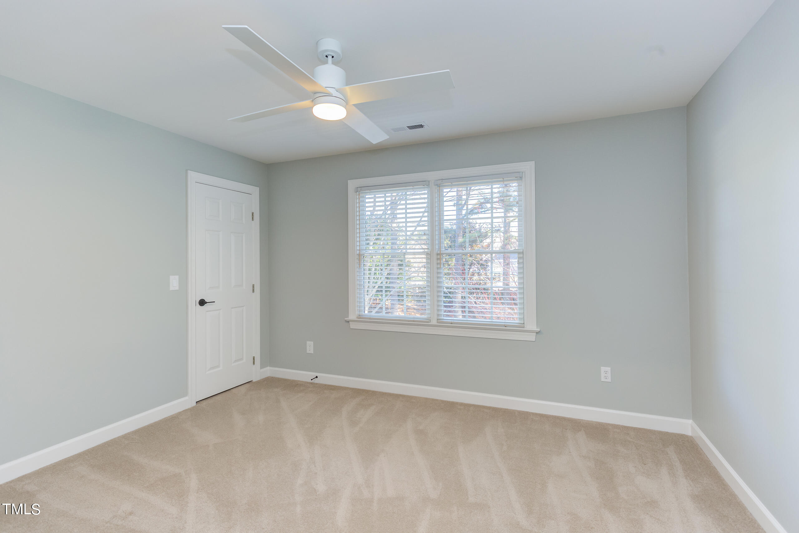 737 Loch Highlands Drive Raleigh, NC 27606 - Photo 52 of 85 an empty room with a window