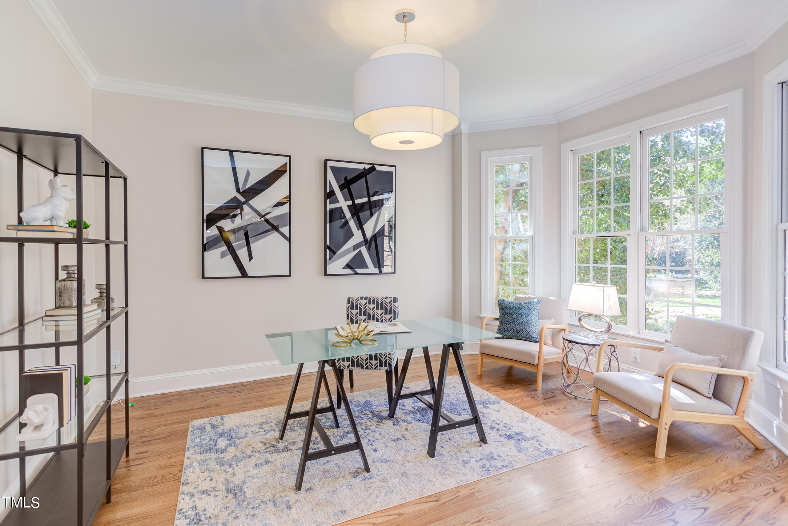 737 Loch Highlands Drive Raleigh, NC 27606 - Photo 6 of 85 a living room with furniture a window and a chandelier