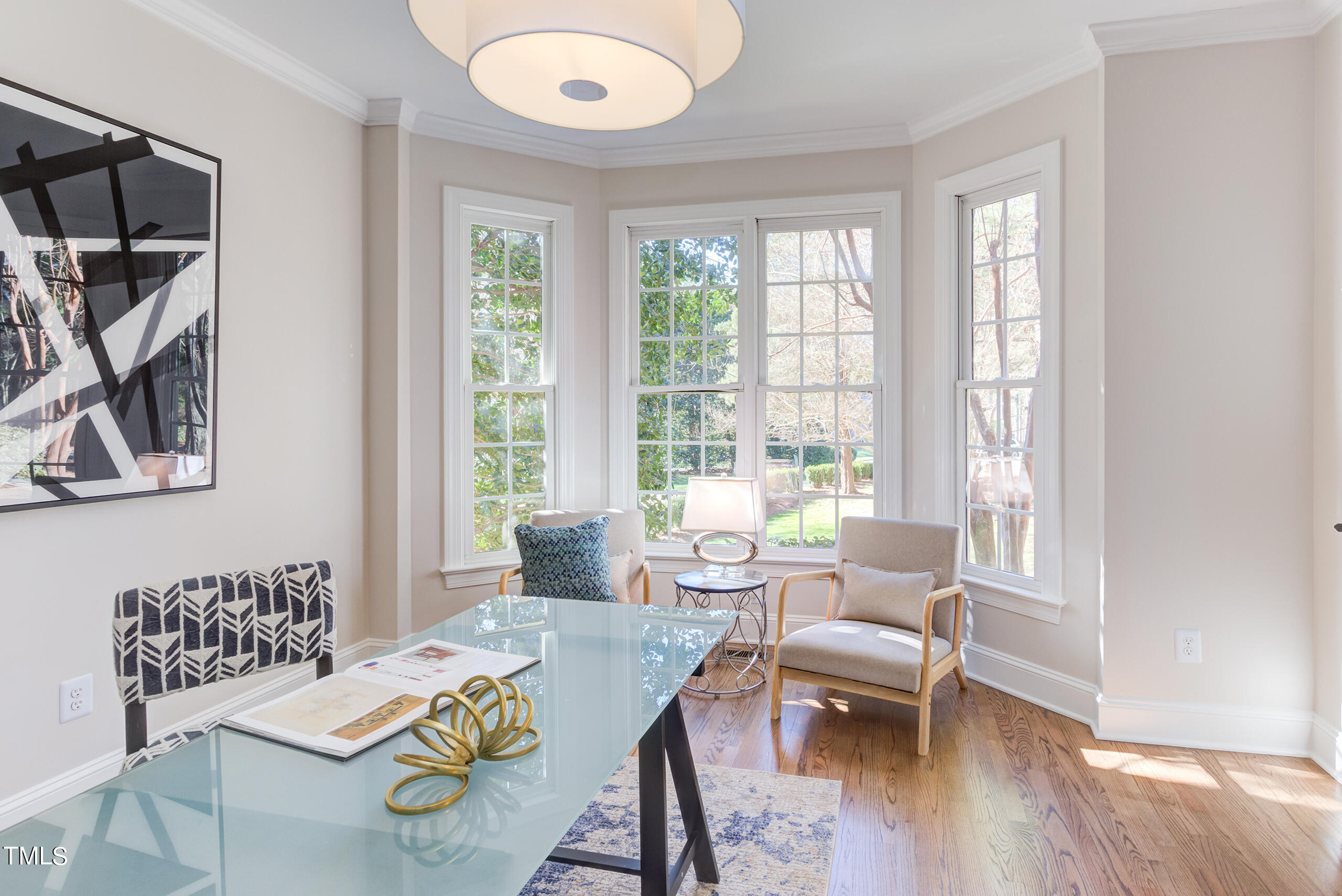 737 Loch Highlands Drive Raleigh, NC 27606 - Photo 7 of 85 a living room with furniture and a large window