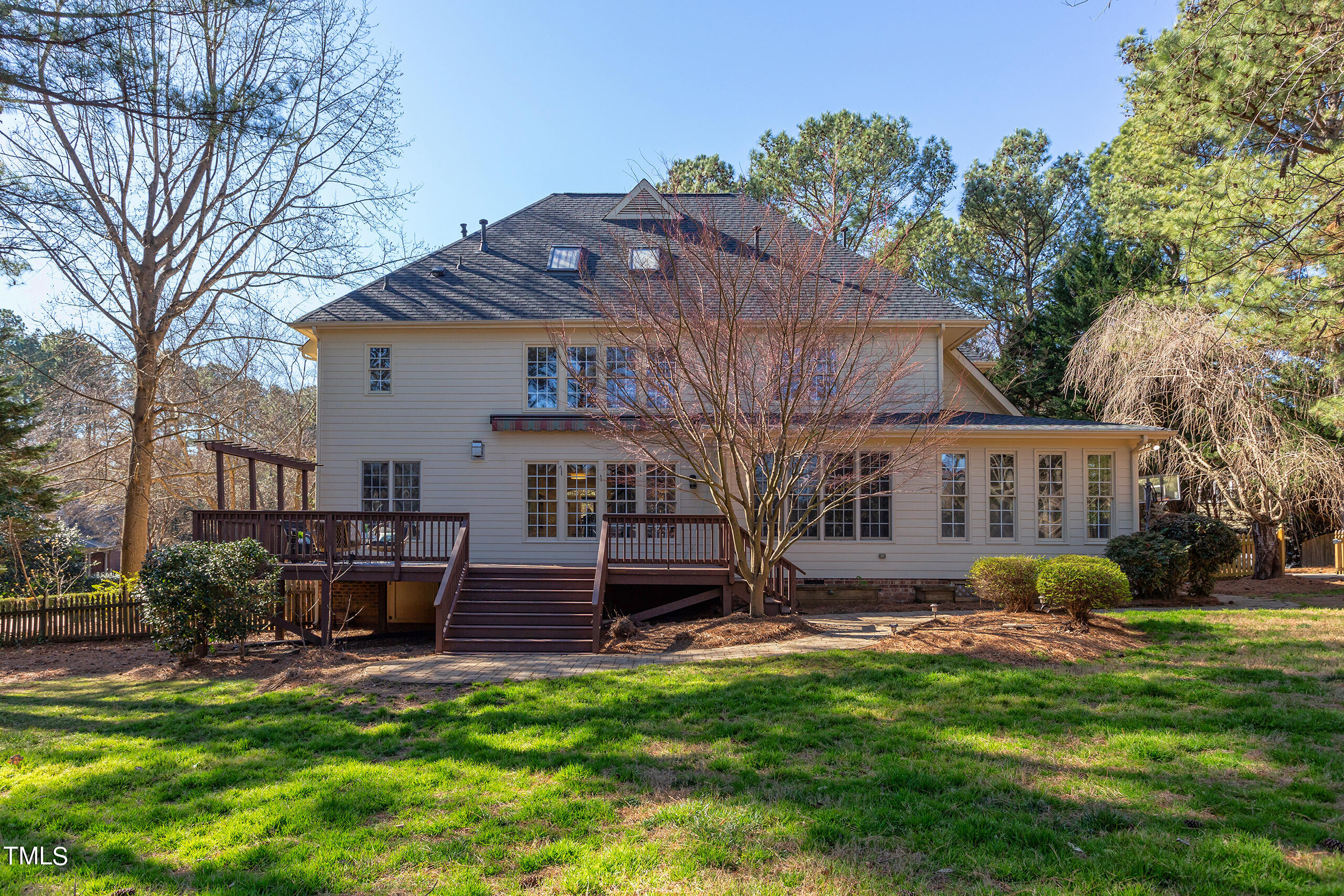 737 Loch Highlands Drive Raleigh, NC 27606 - Photo 76 of 85 a view of a house with a yard