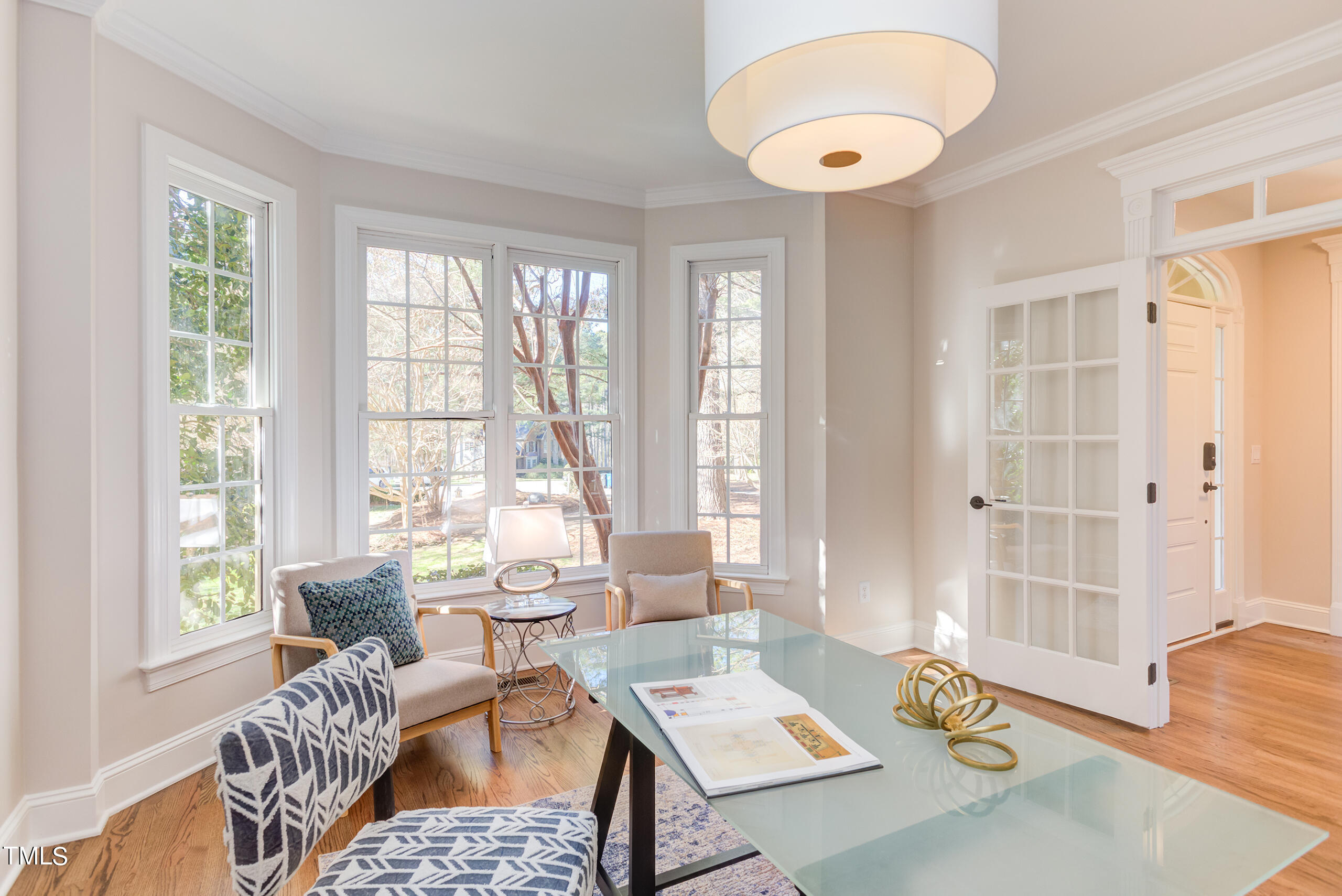 737 Loch Highlands Drive Raleigh, NC 27606 - Photo 8 of 85 a living room with furniture and a large window