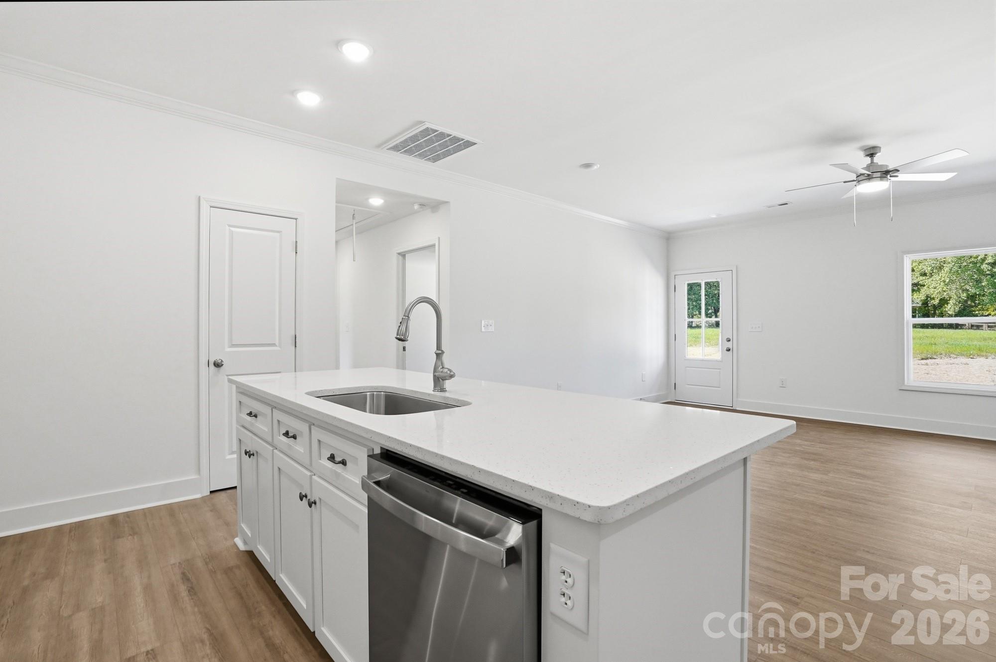339 Peachtree Road Rock Hill, SC 29730 - Photo 14 of 39 a kitchen with a sink cabinets and wooden floor