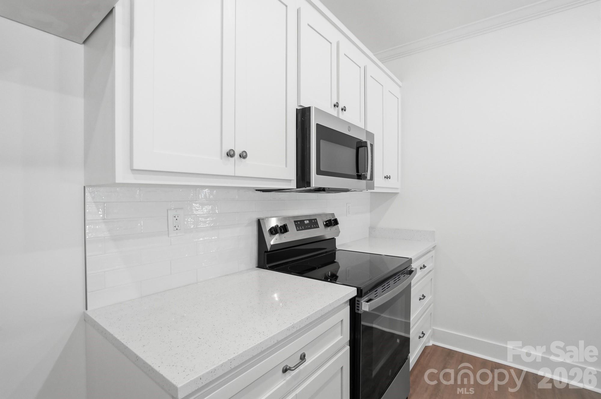 339 Peachtree Road Rock Hill, SC 29730 - Photo 16 of 39 a kitchen with a sink cabinets and microwave