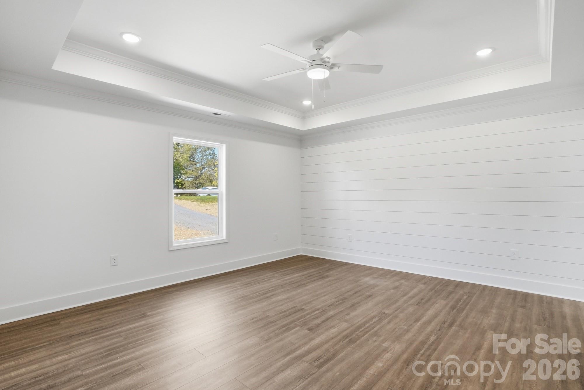 339 Peachtree Road Rock Hill, SC 29730 - Photo 18 of 39 an empty room with wooden floor and windows
