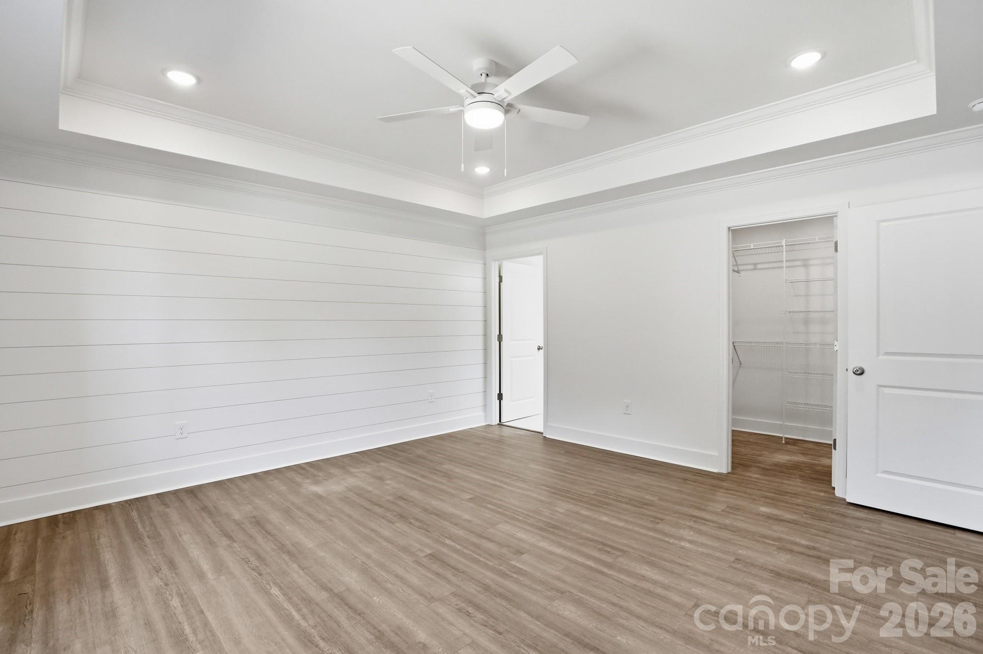 339 Peachtree Road Rock Hill, SC 29730 - Photo 19 of 39 an empty room with wooden floor and ceiling fan