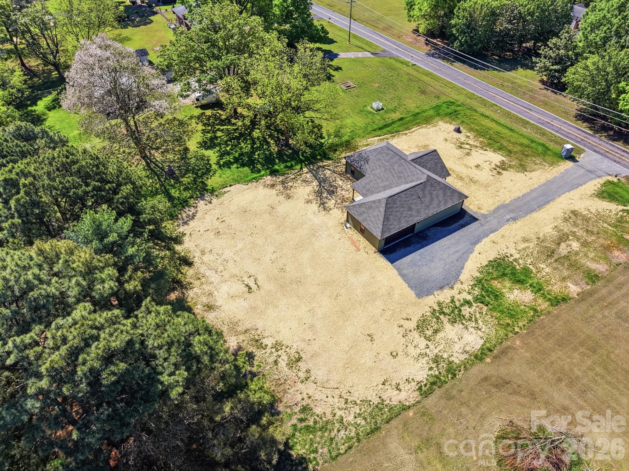 339 Peachtree Road Rock Hill, SC 29730 - Photo 4 of 39 a view of a yard with a tree