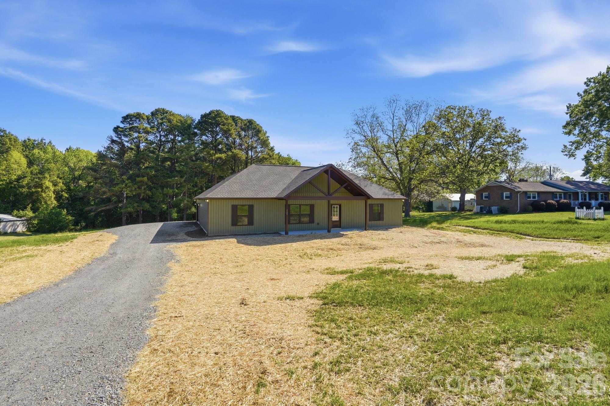 339 Peachtree Road Rock Hill, SC 29730 - Photo 5 of 39 a front view of a house with a yard