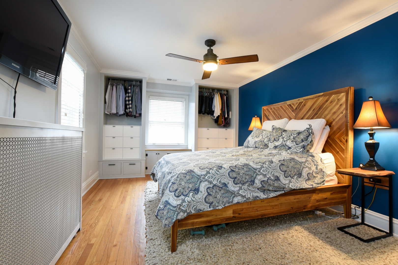 328 Olmsted Road Riverside, IL 60546 - Photo 32 of 45 a bedroom with a bed and a chandelier