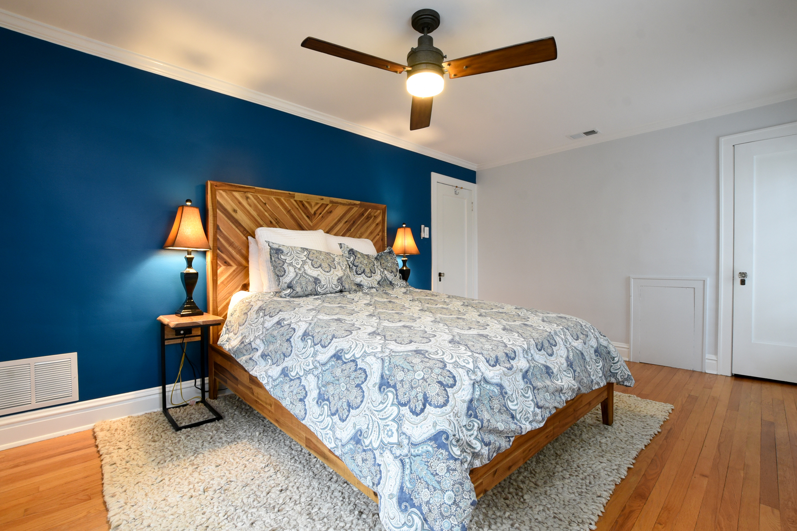 328 Olmsted Road Riverside, IL 60546 - Photo 33 of 45 a bedroom with a bed and wooden floor