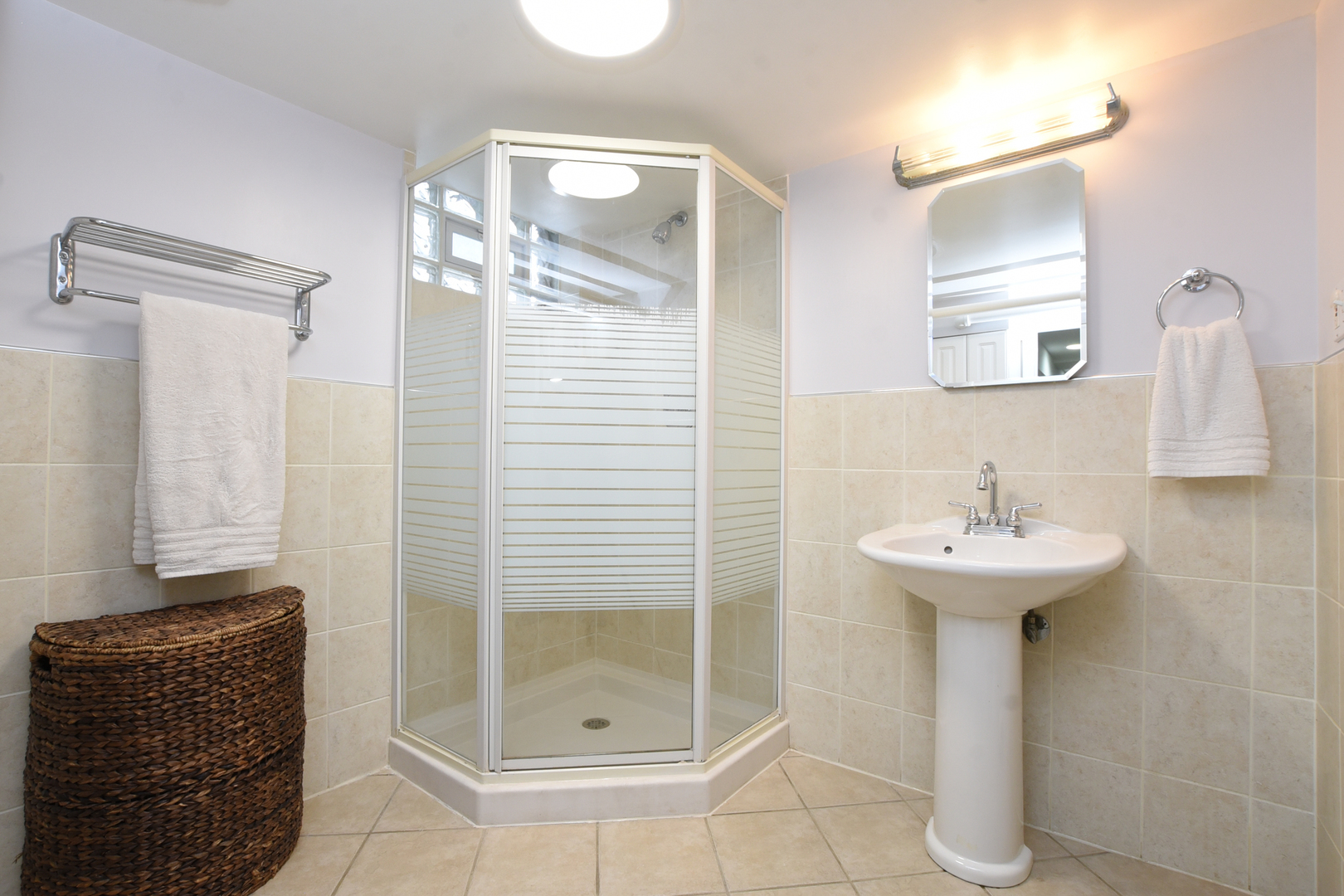 328 Olmsted Road Riverside, IL 60546 - Photo 41 of 45 a bathroom with a sink and a mirror