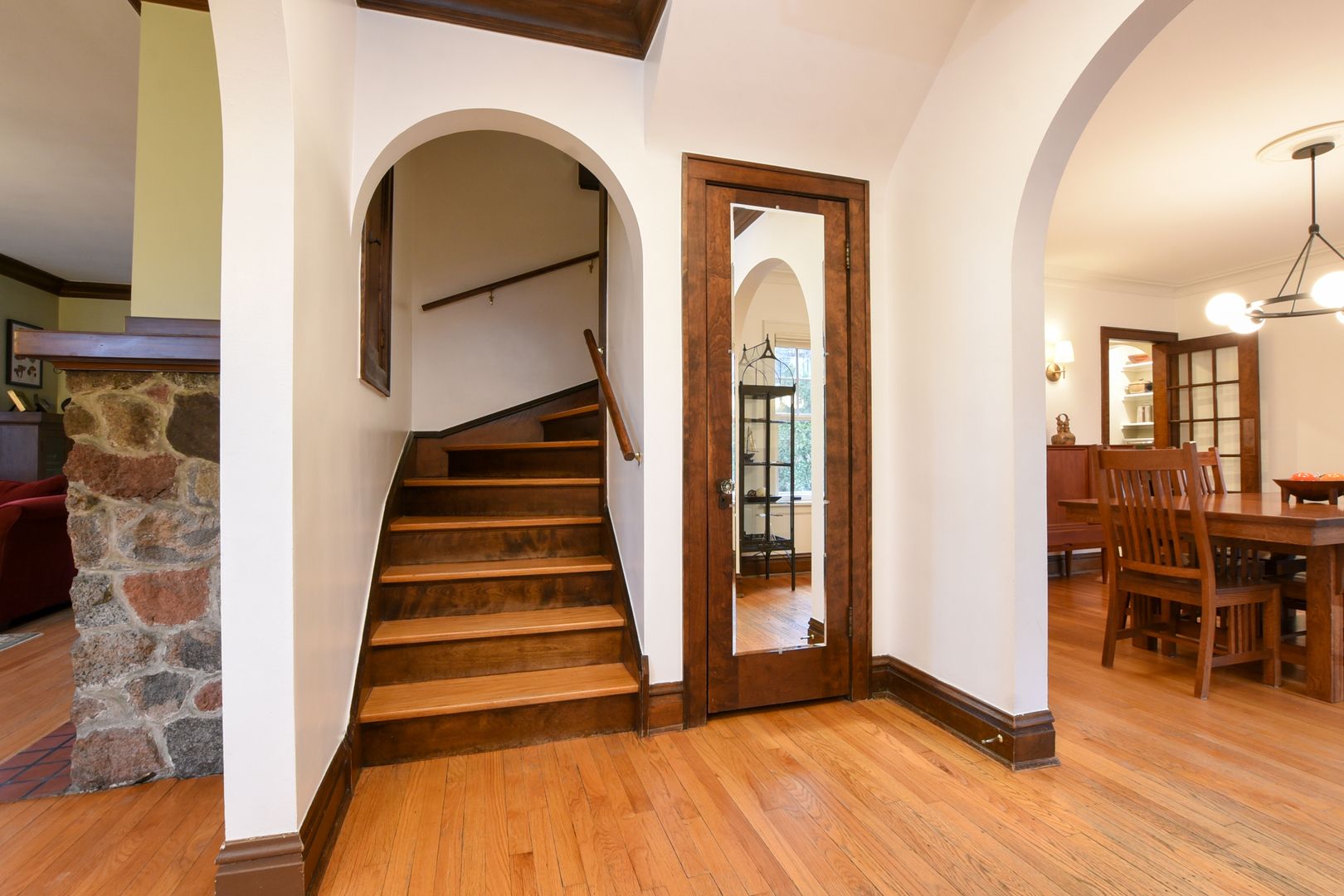 328 Olmsted Road Riverside, IL 60546 - Photo 8 of 45 a view of entryway and hall with wooden floor