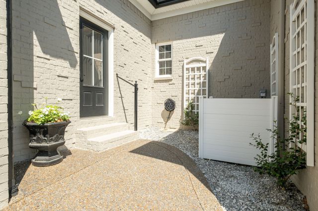 a view of a entryway with wooden floor