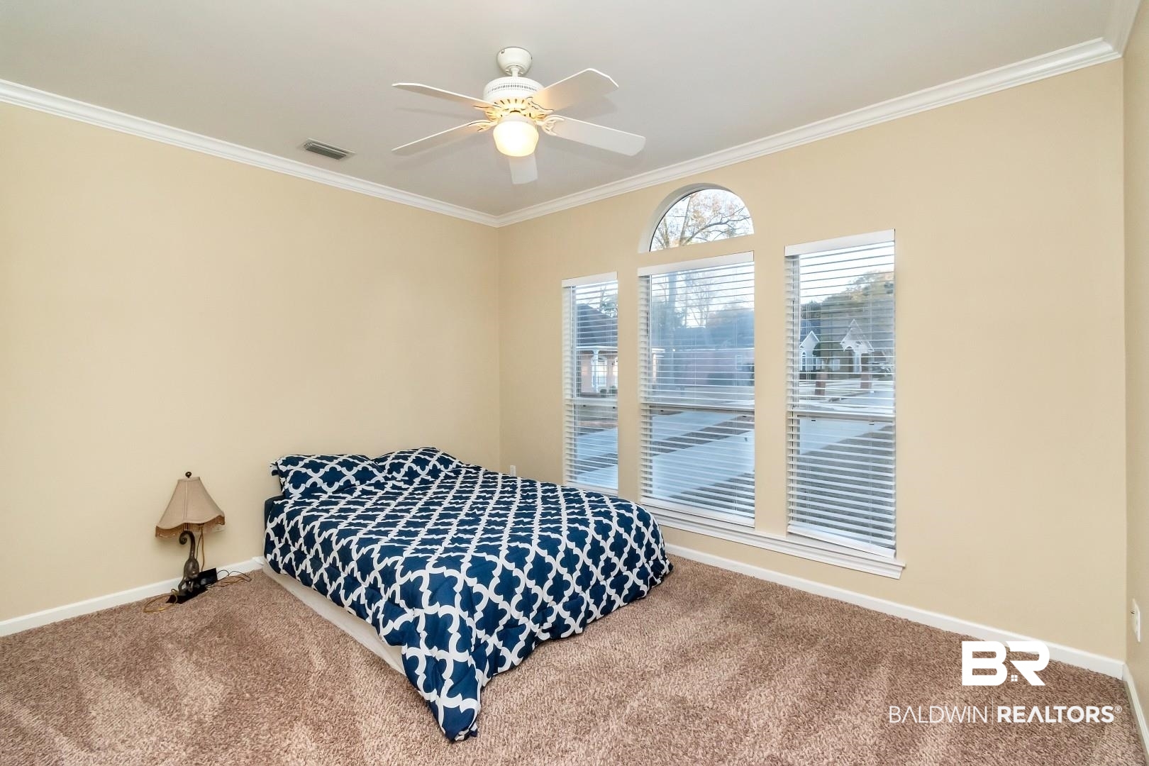 1050 Southern Way Court Mobile, AL 36609 - Photo 18 of 36 Bedroom with ceiling fan, ornamental molding, and carpet flooring
