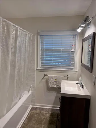 a bathroom with a sink and a bathtub
