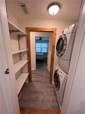 a view of balcony with wooden floor