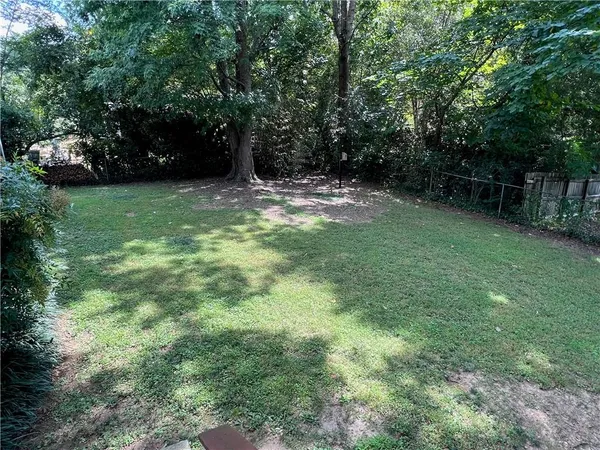 a fire hydrant in the middle of a field