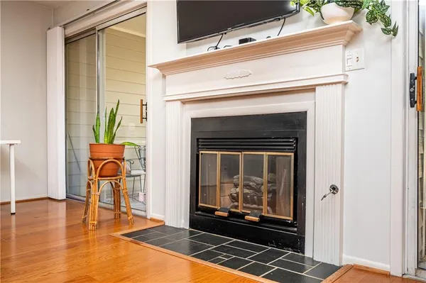 a living room with a fireplace