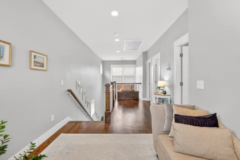 a living room with furniture and a table