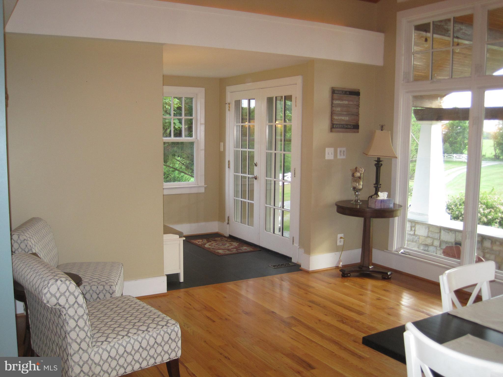 222 Stringtown Road Berryville, VA 22611 - Photo 9 of 29 a living room with furniture and a window