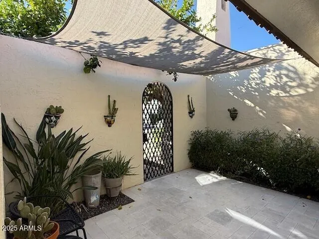a view of a house with a street