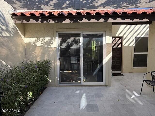 1246 East Palacio Lane Phoenix, AZ 85014 - Photo 4 of 17 a front view of a house with a garden