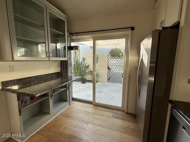 1246 East Palacio Lane Phoenix, AZ 85014 - Photo 6 of 17 a kitchen with stainless steel appliances granite countertop a refrigerator and a sink