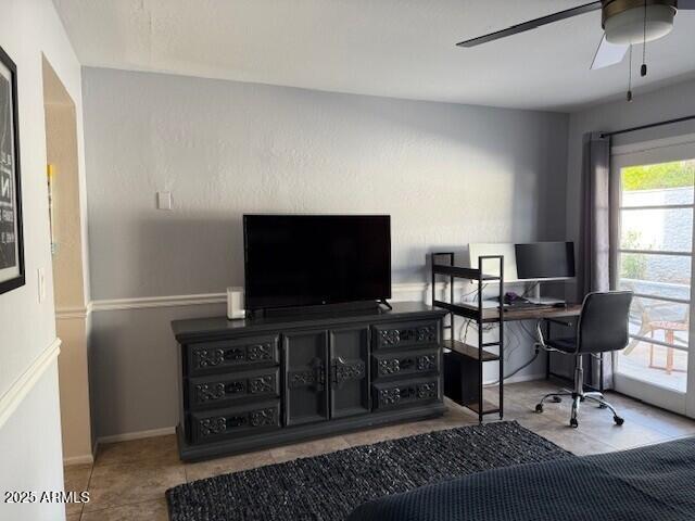 1246 East Palacio Lane Phoenix, AZ 85014 - Photo 9 of 17 a living room with furniture and a flat screen tv