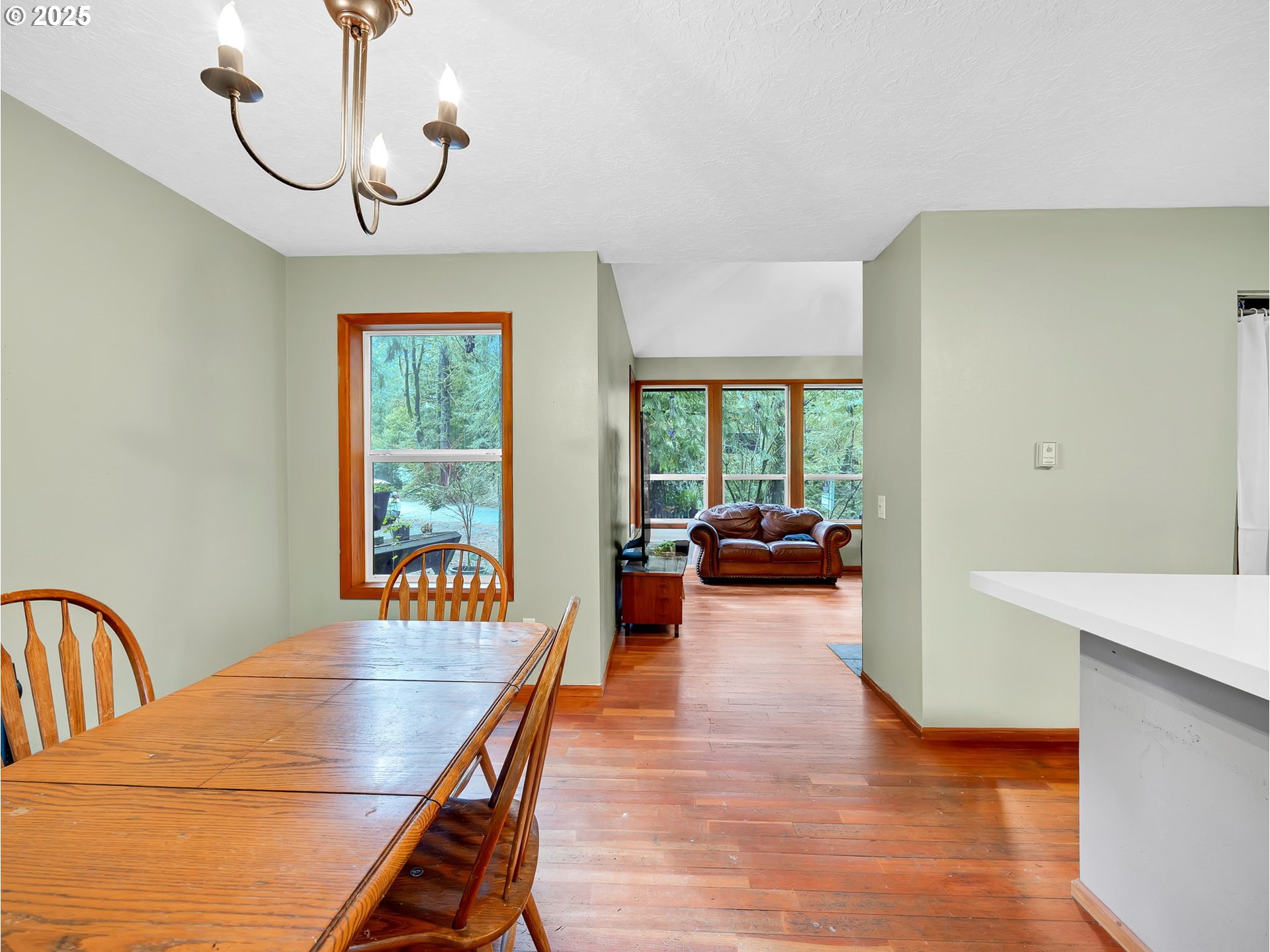 64711 East Sandy River Lane Rhododendron, OR 97049 - Photo 9 of 47 a living room with furniture and a table
