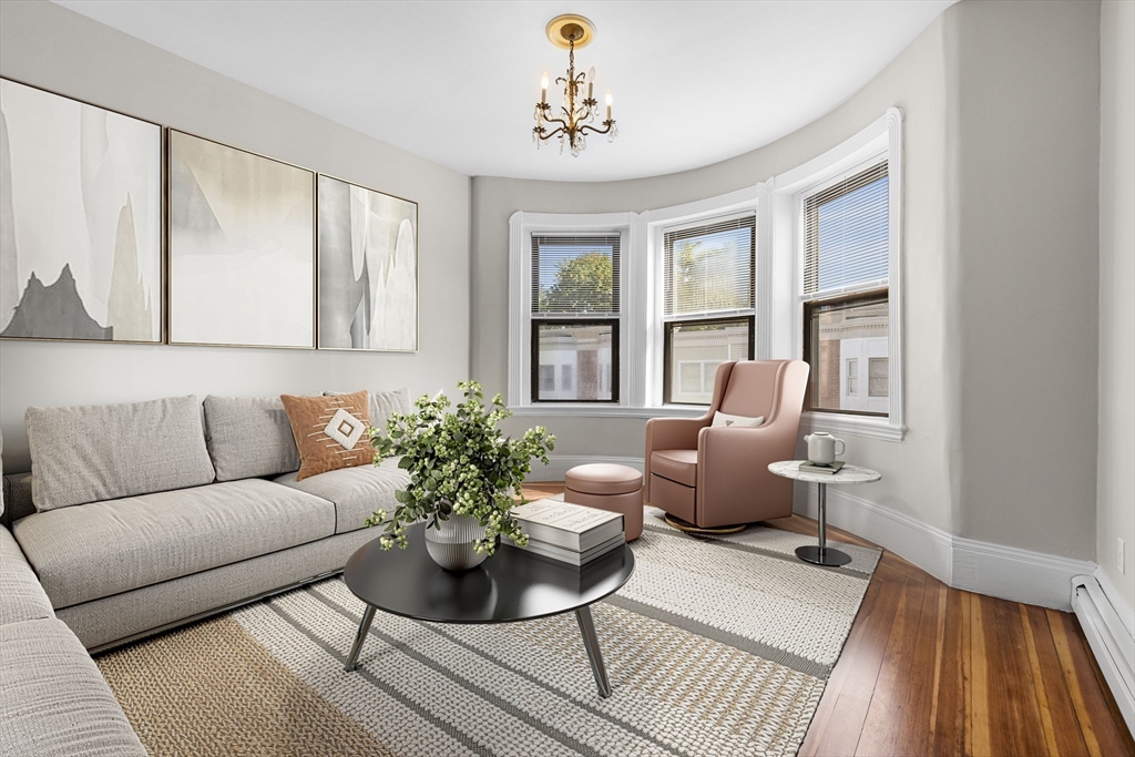 a living room with furniture or couch and a window