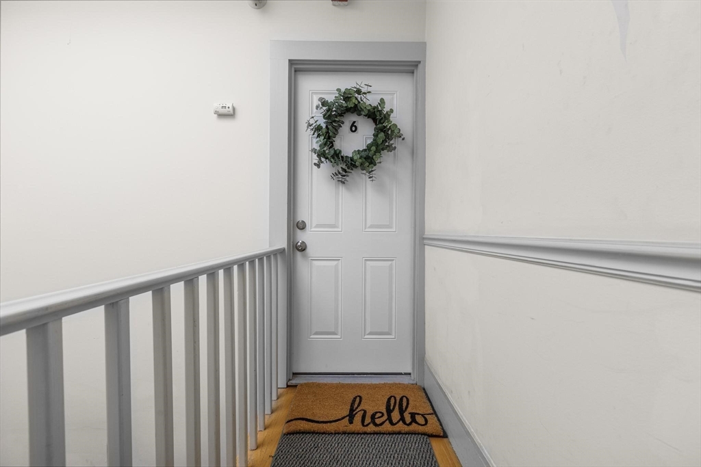 32-34 Ditson Street, Unit 6 Boston, MA 02122 - Photo 20 of 27 a view of a hallway