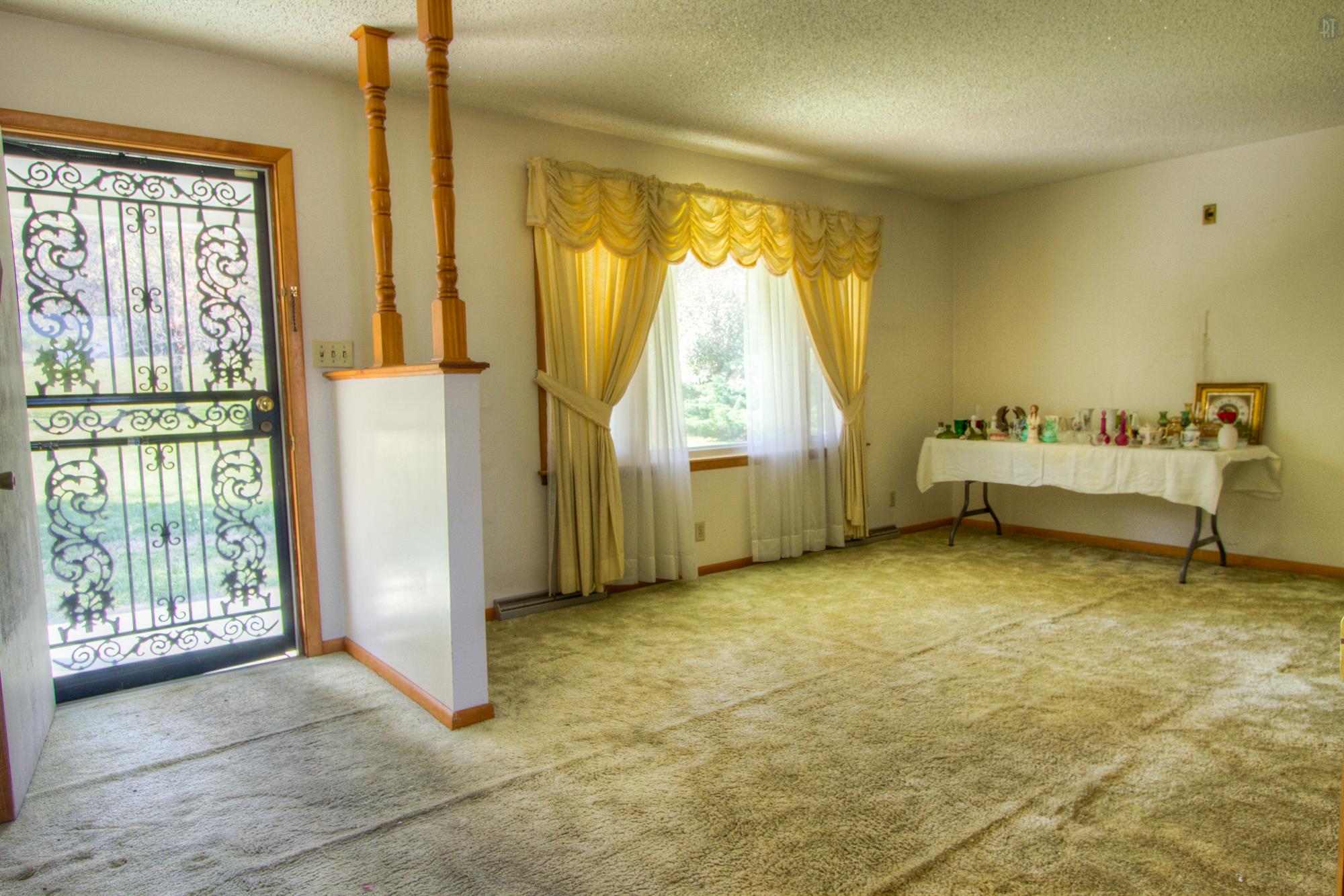 472 Franklin Road Franklin, TN 37069 - Photo 5 of 20 a view of an empty room with a window