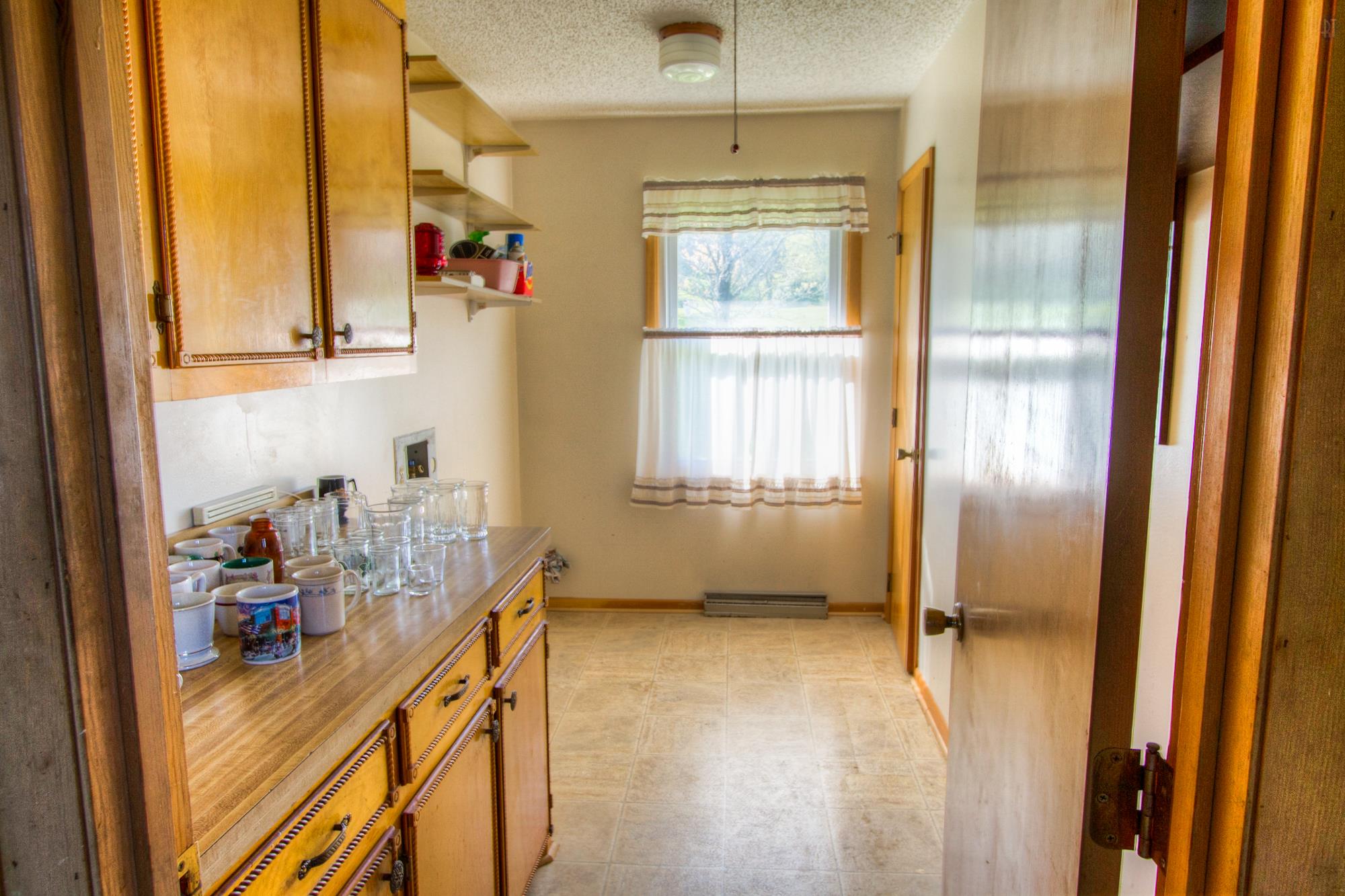 472 Franklin Road Franklin, TN 37069 - Photo 9 of 20 a kitchen with sink refrigerator and window