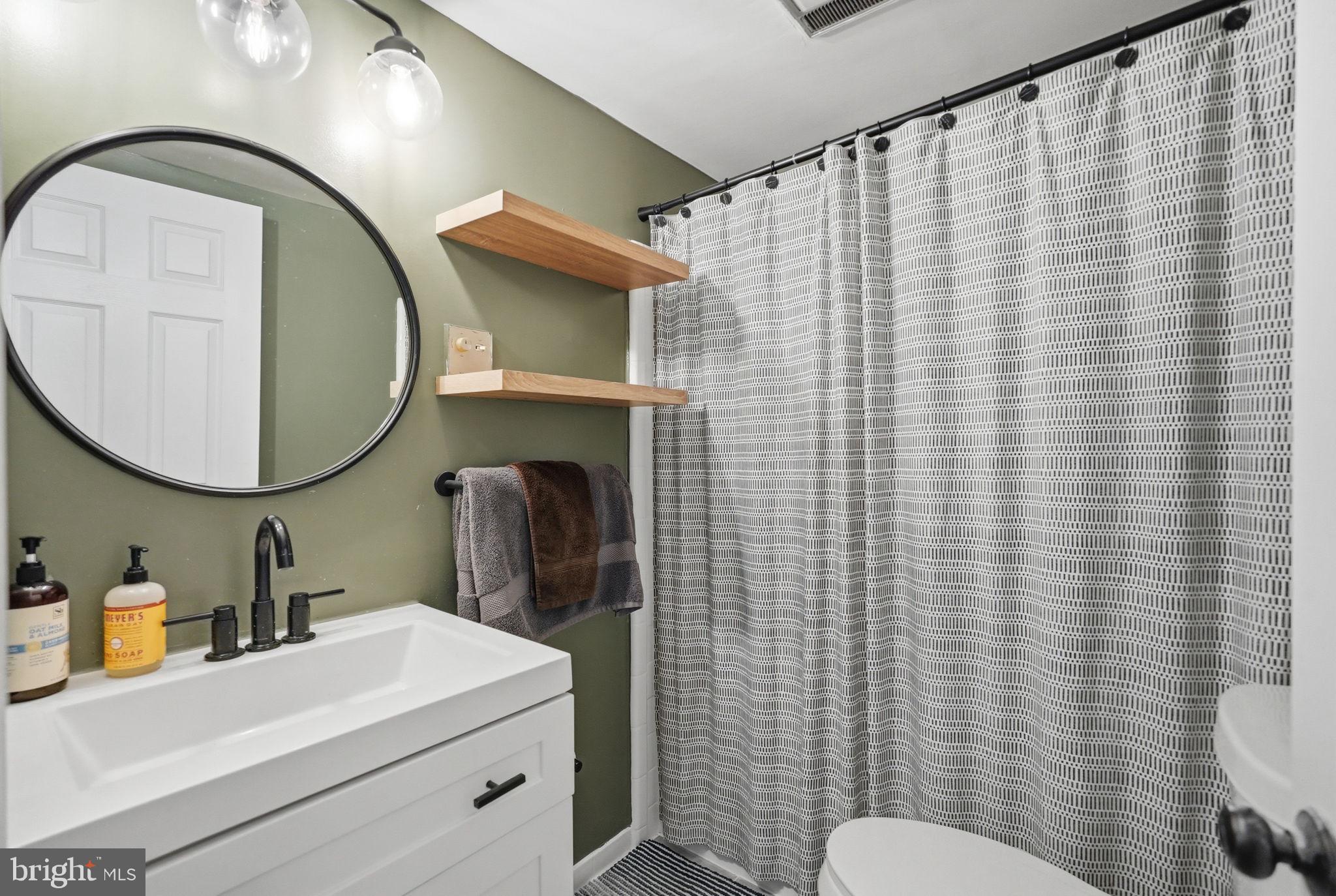 1712 Corcoran Street Northwest, Unit 2 Washington, DC 20009 - Photo 14 of 22 Updated Bathroom