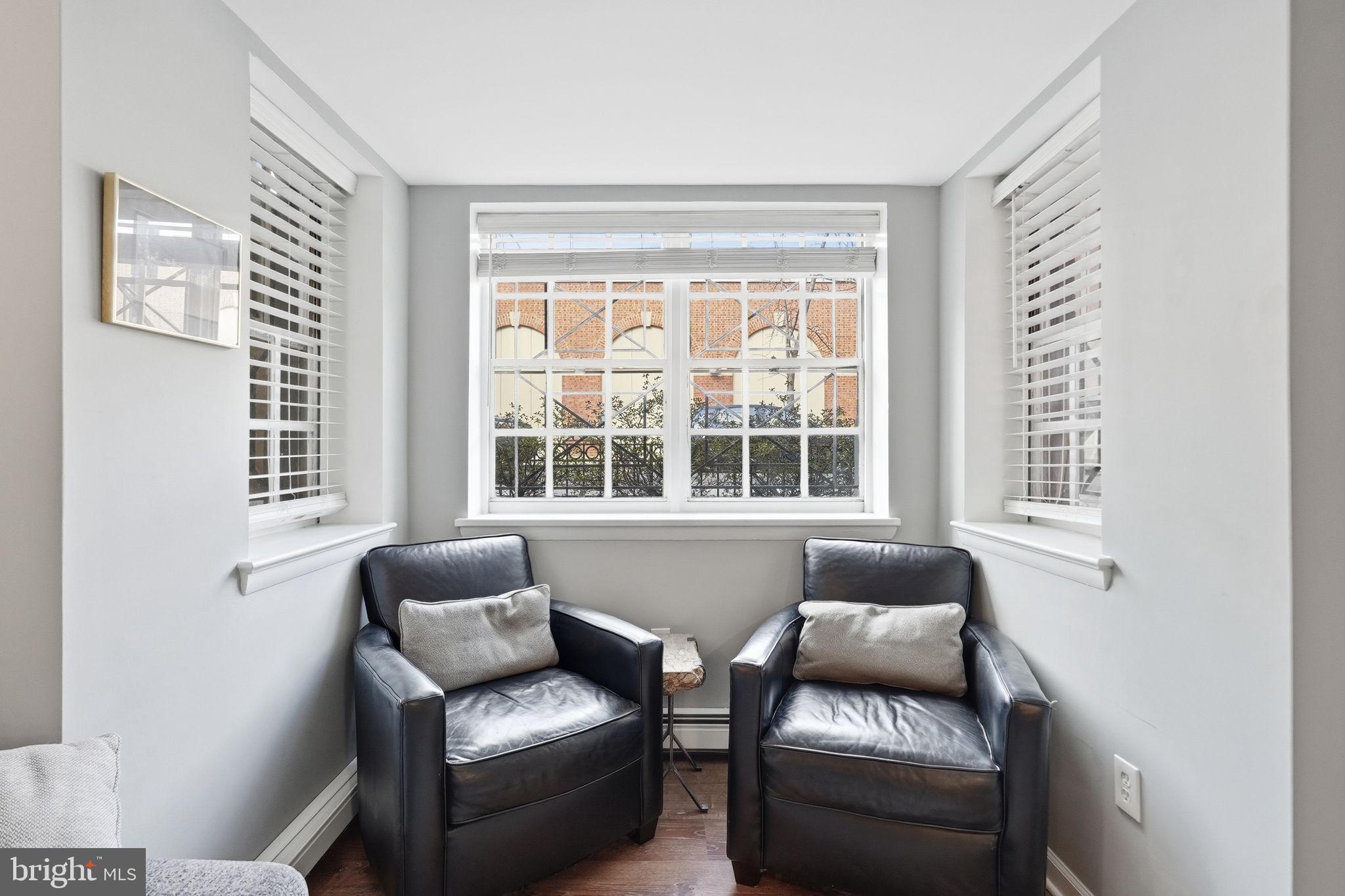 1712 Corcoran Street Northwest, Unit 2 Washington, DC 20009 - Photo 6 of 24 a living room with furniture and a window