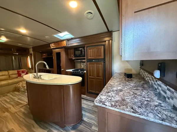 a kitchen with a stove and a refrigerator