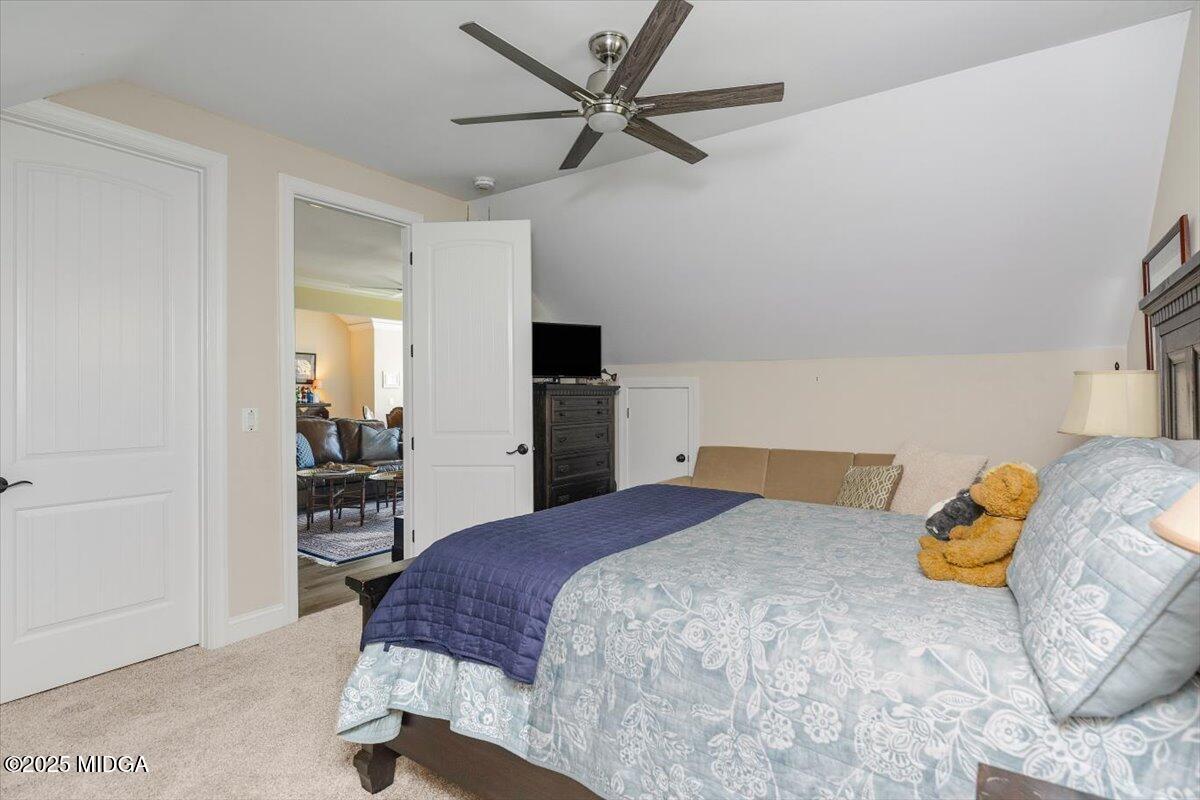 7746 Lower Thomaston Road Macon, GA 31220 - Photo 54 of 80 a bedroom with a bed and a cabinets