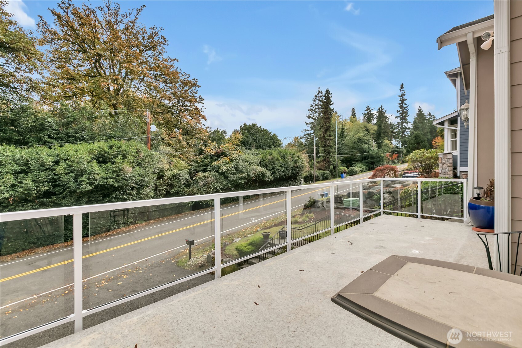 26525 Lake Fenwick Road South Kent, WA 98032 - Photo 14 of 40 a view of a roof deck with wooden fence and floor